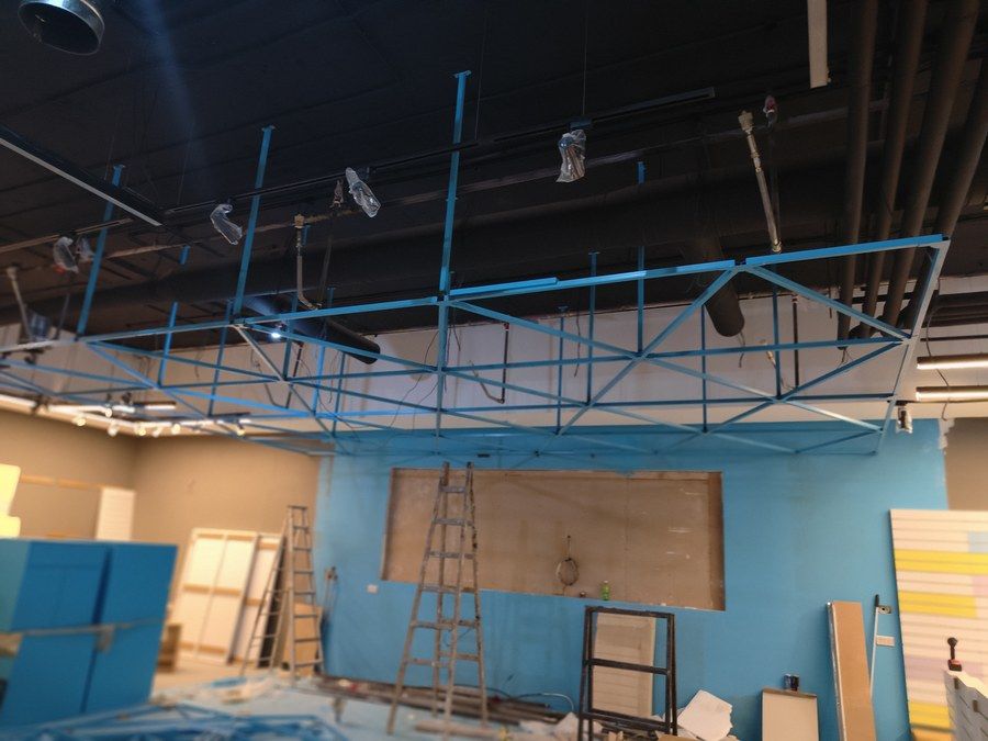 Steel framework and services built on site during a retail store fit-out