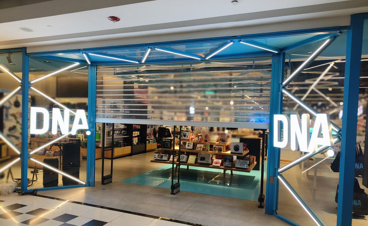 Lit steel entrance frame with backlit lettering