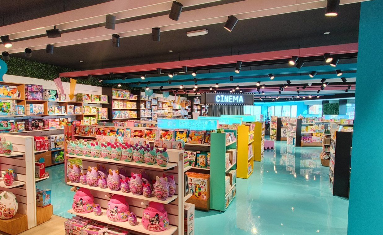 Retail interior with cinema-style feature and colourful fixtures