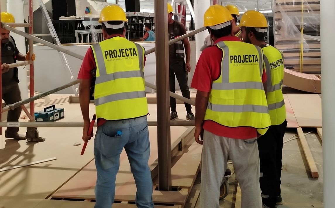 PROJECTA installation crew building an exhibition stand on site