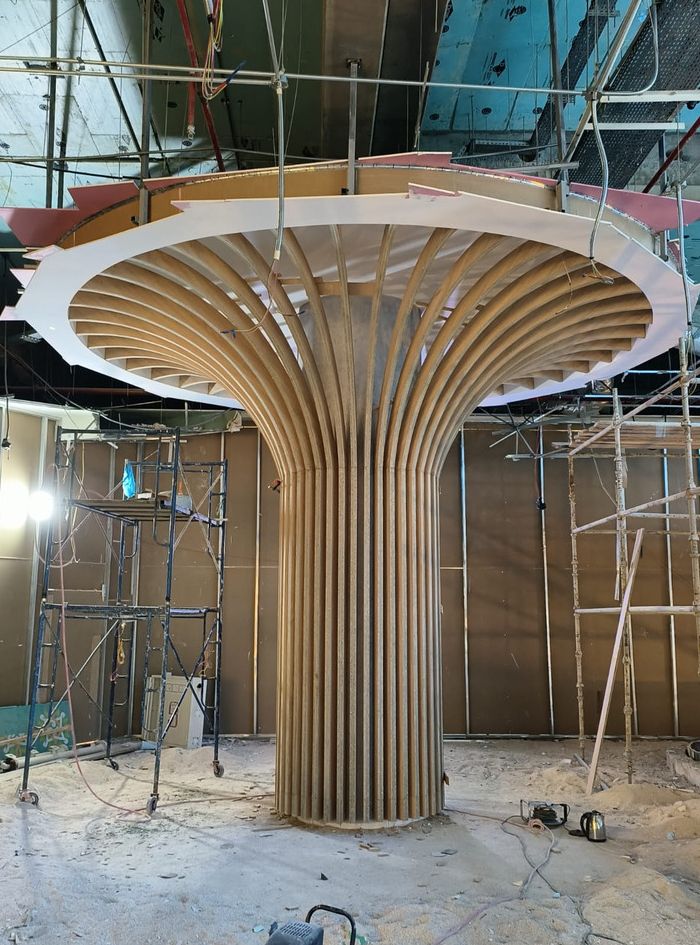 Timber-slat feature column under construction